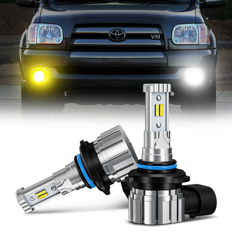 9006 LED fog light bulbs installed on a 2000-2006 Toyota Tundra, showing bright 12,000LM white and yellow beam output for enhanced visibility.
