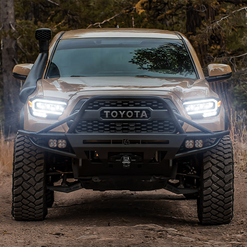 2016-2023 Toyota Tacoma LED projector headlights mounted on car with lights on