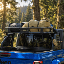 Jeep Gladiator JT roll bar with cargo basket installed above the open truck bed