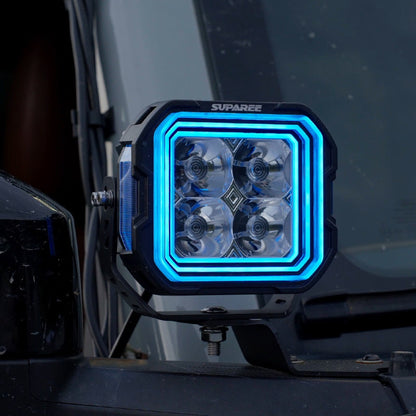 SUPAREE HYPER 5 RGBW LED pod light with blue three-layer backlight mounted beside the windshield.