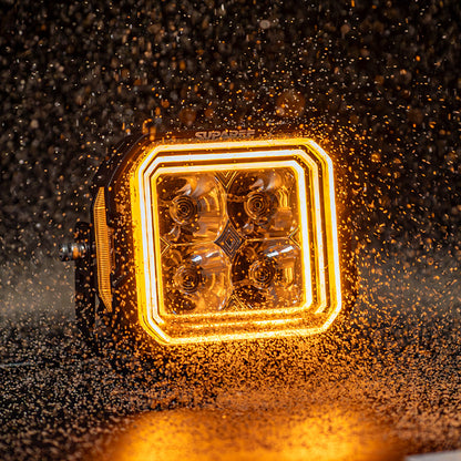 SUPAREE HYPER 5 LED pod light with amber backlighting under water spray.