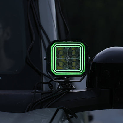 SUPAREE HYPER 5 LED pod light with green backlighting installed beside the windshield.