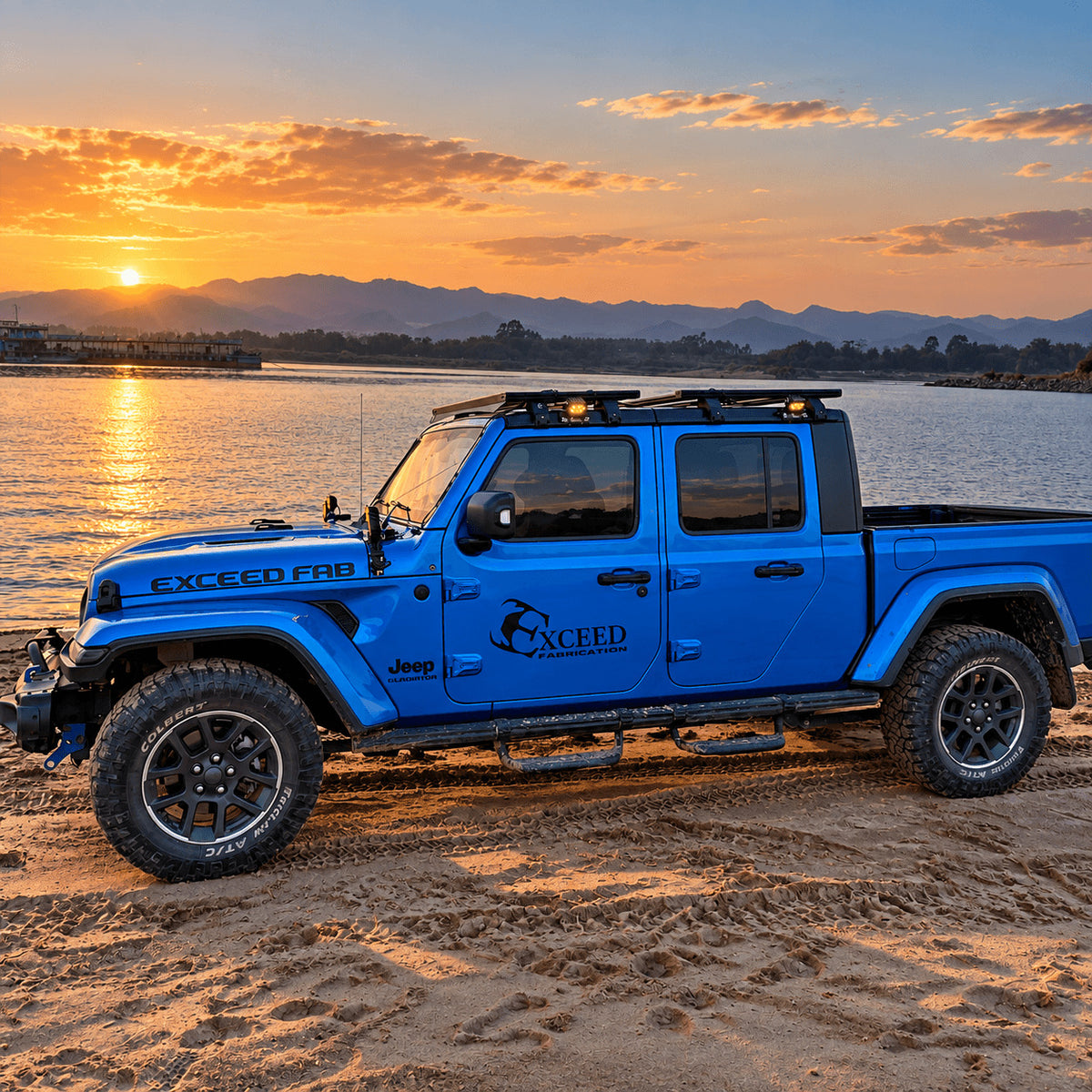 Blue Jeep Gladiator with side steps parked beside the water at sunset.