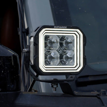 Close-up of a SUPAREE HYPER 5 RGBW LED pod light with white three-layer backlighting.