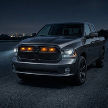 Ram 1500 amber LED grille lights illuminated at night