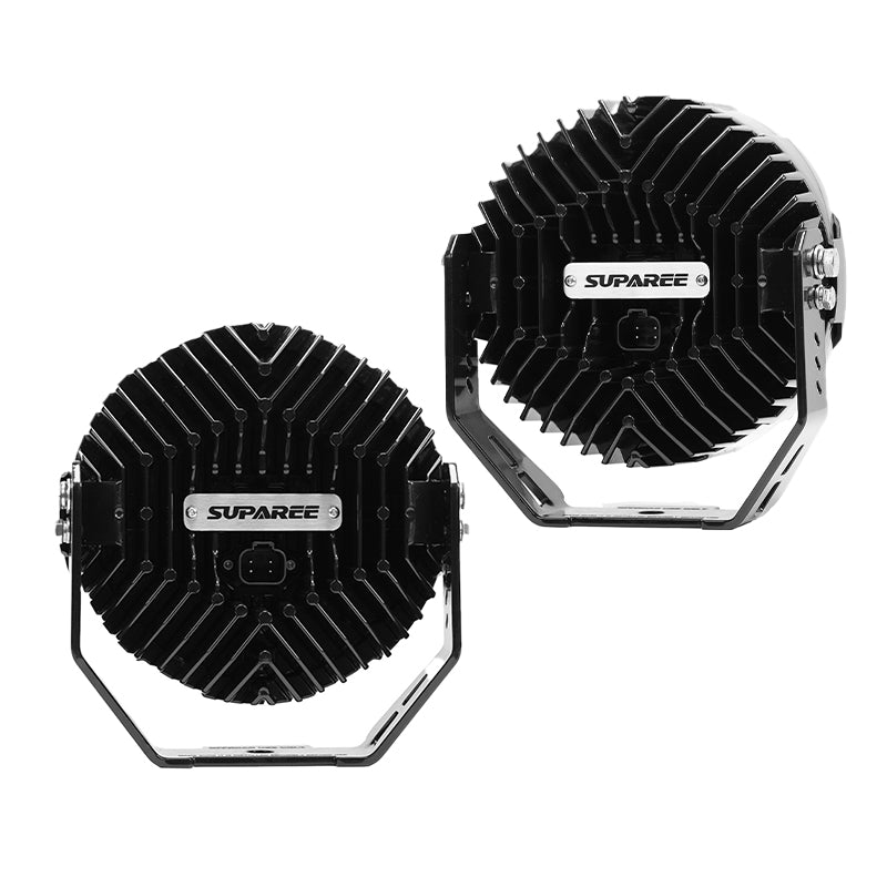 Rear view of two SUPAREE HELM 7 LED driving lights showing black cooling fins and metal mounting brackets.