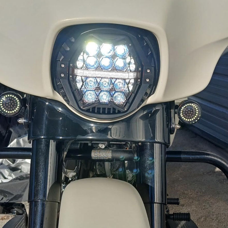 Harley honeycomb headlight mounted on car with lights on