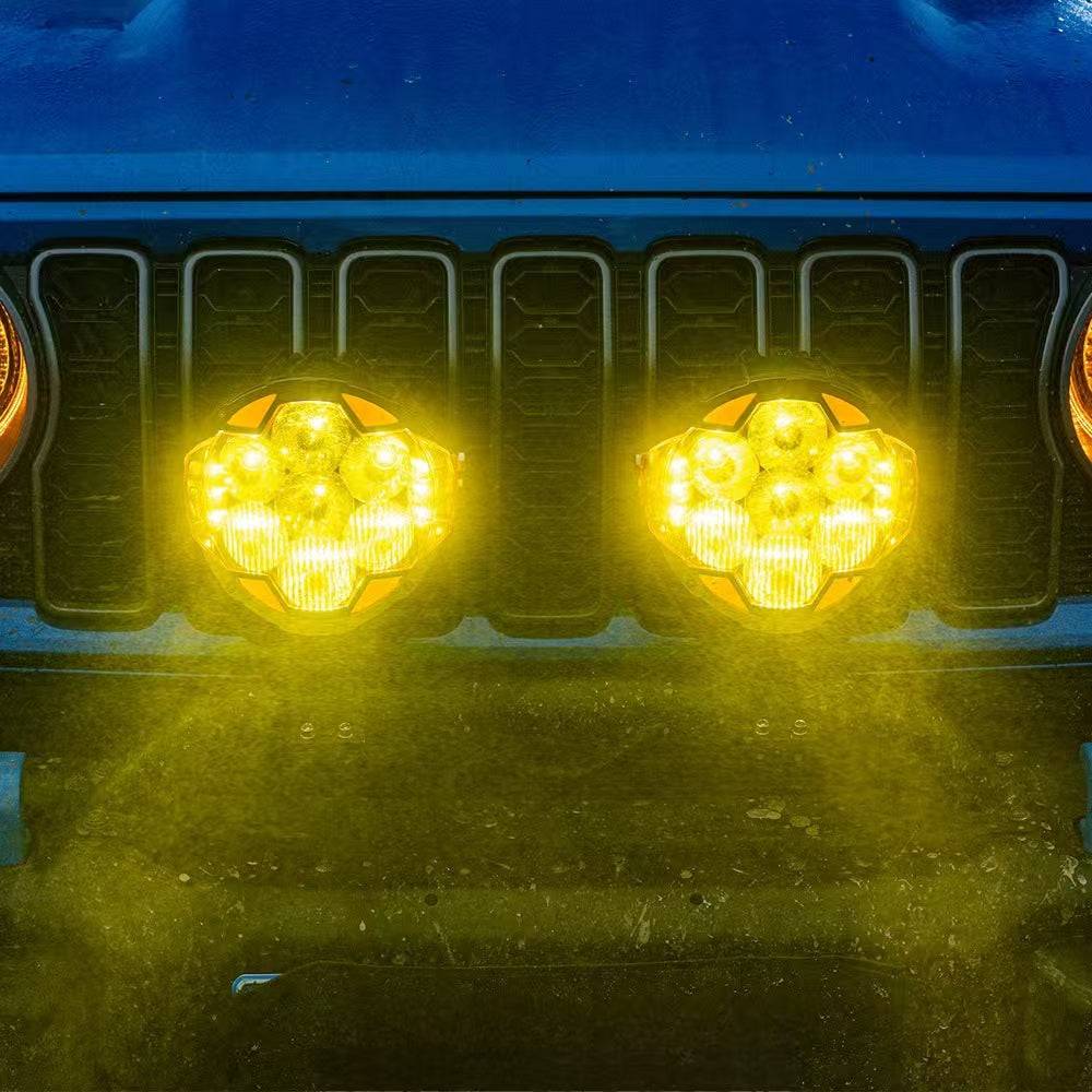 7 inch off road LED pod lights mounted on Jeep truck for night trail driving