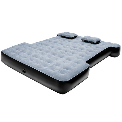 Durable inflatable truck bed air mattress designed for 5.5FT beds in 2000-2025 Toyota Tundra. Features two pillows and contoured wheel well cutouts.