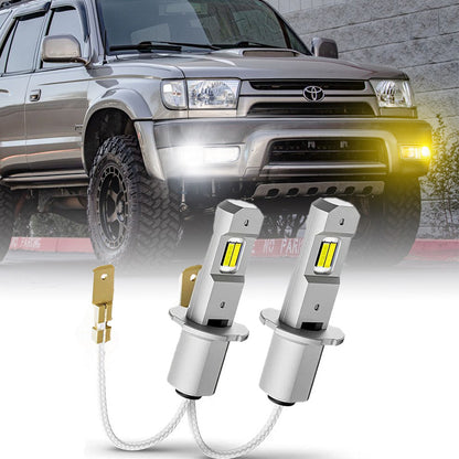 H3 Dual Color LED Fog Light Bulbs installed on a 1999-2002 Toyota 4Runner, emitting bright yellow light for enhanced visibility.