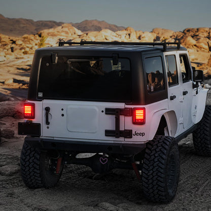 Jeep JK Tail Lights mounted and lit on the car