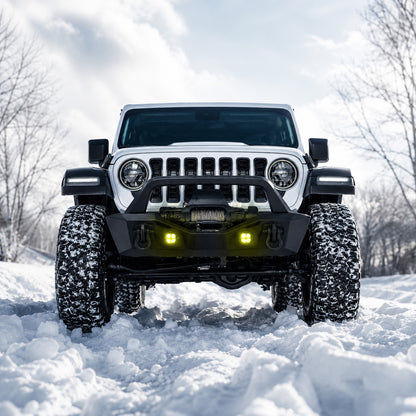 Jeep Wrangler JL amber LED fog lights lighting a snowy off-road trail