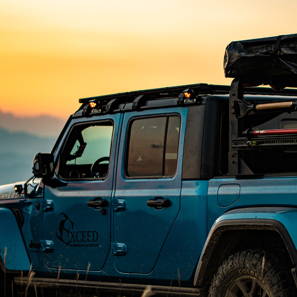 Low-profile-aerodynamic-roof-ditch-light-bracket-installed-on-Jeep-Wrangler-JL-side-gutter