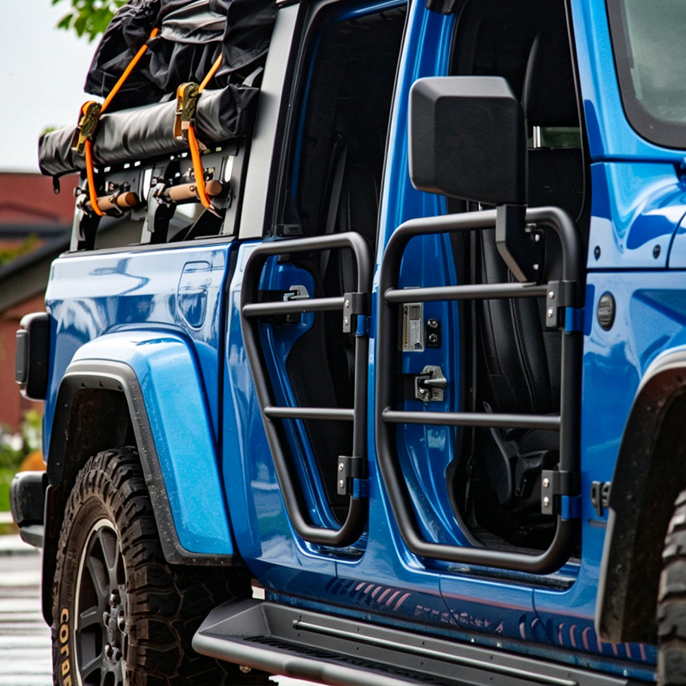 Side view of a blue Jeep Gladiator JT fitted with four SD1 SERIES tube doors on a rocky trail