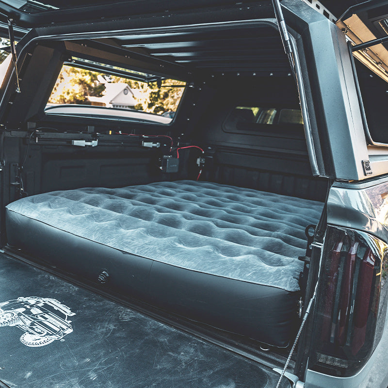 Truck Bed Air Mattress - Tundra Fit | Inflatable, Durable. Custom-fit inflatable air mattress in 5.5FT bed of Toyota Tundra, ideal for camping comfort.