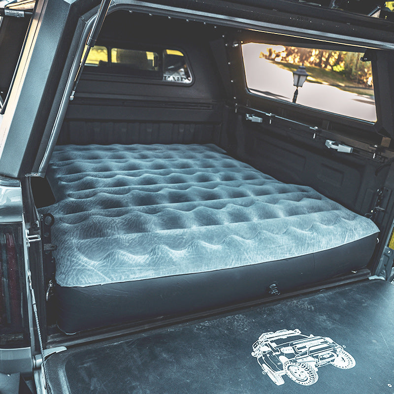 Truck Bed Air Mattress - Tundra Fit | Inflatable, Durable shown fully inflated in a 5.5FT Toyota Tundra bed with canopy. Ideal for camping comfort.