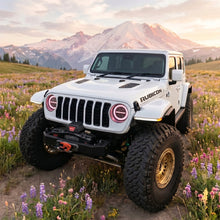 jeep-wrangler-custom-led-headlights-with-glowing-rgb-halo-ring-and-four-visible-projector-lenses-in-a-dark-garage