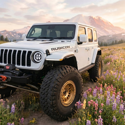 jeep-wrangler-custom-led-headlights-with-glowing-rgb-halo-ring-and-four-visible-projector-lenses-in-a-dark-garage