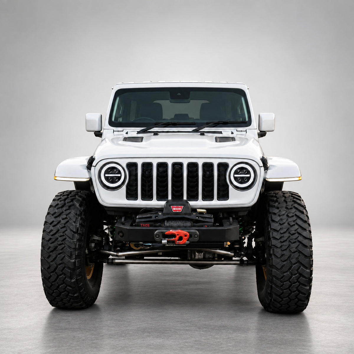 9-inch RGB LED headlights for Jeep Wrangler JL/JLU and Gladiator JT shown in white DRL mode on a white Jeep