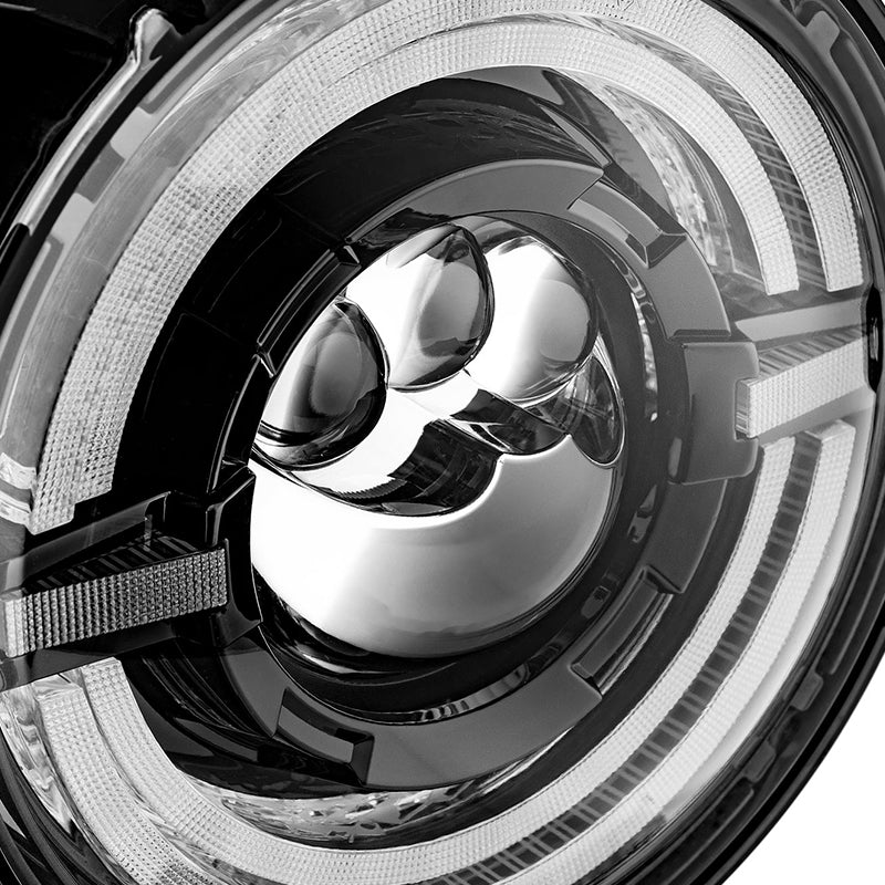 jeep wrangler jl headlights designed with 4 lenses in the middle with double halo rings.