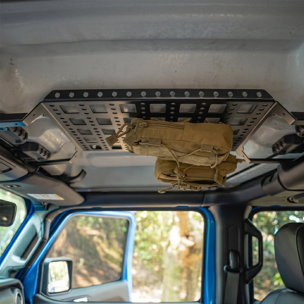 Modular Jeep Gladiator JT overhead molle panel demonstrating compatibility with removable front Freedom Top panels