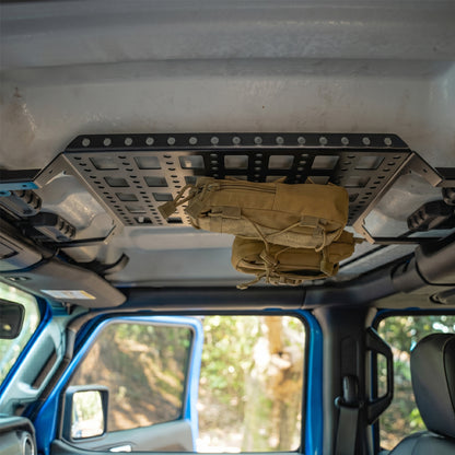 Modular Jeep Gladiator JT overhead molle panel demonstrating compatibility with removable front Freedom Top panels