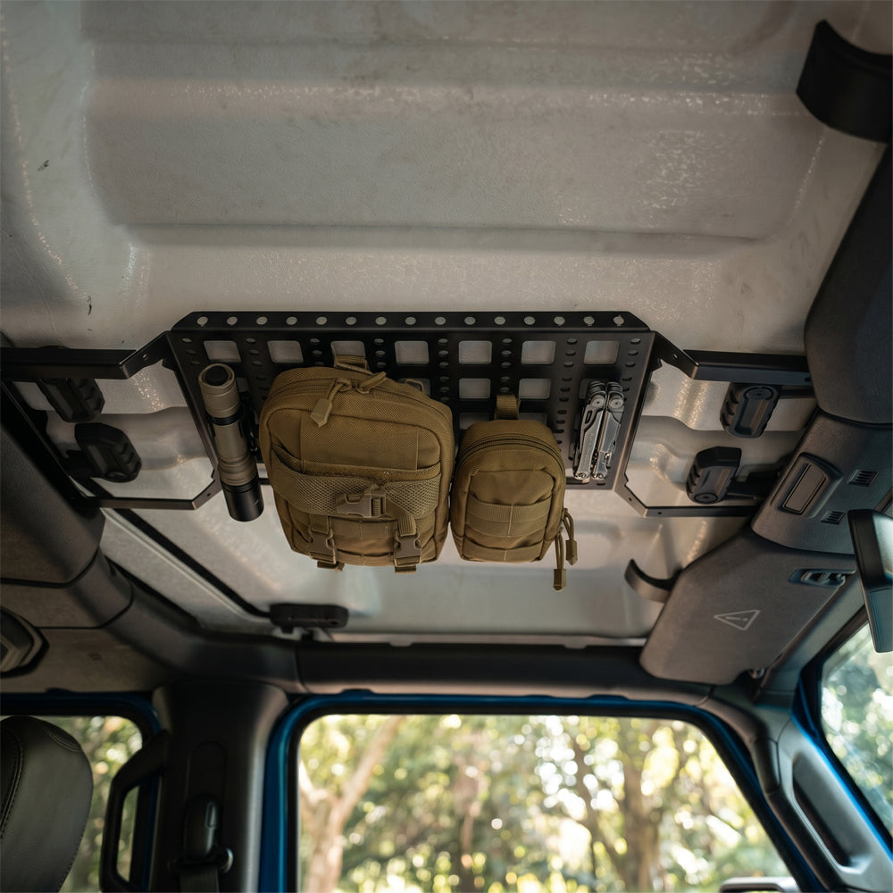 Modular Jeep Gladiator JT overhead molle panel demonstrating compatibility with removable front Freedom Top panels