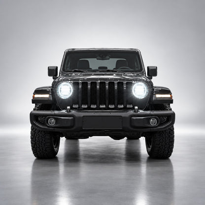 Black Jeep Wrangler JL front view with bright white 9-inch LED headlights