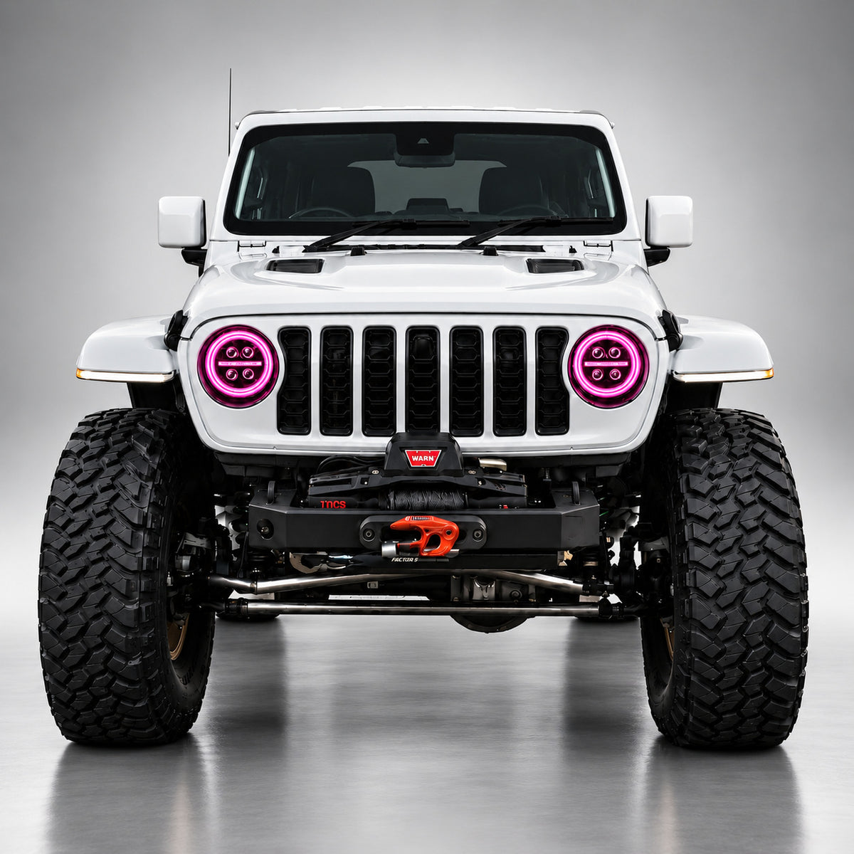 White Jeep Wrangler JL front view with magenta RGB LED headlight halo rings