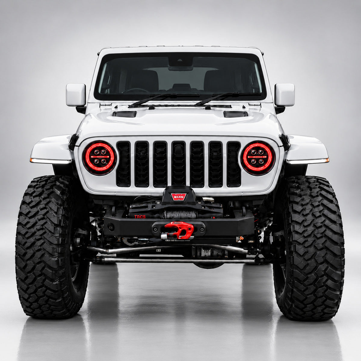 White Jeep Wrangler JL front view with red RGB LED headlight halo rings