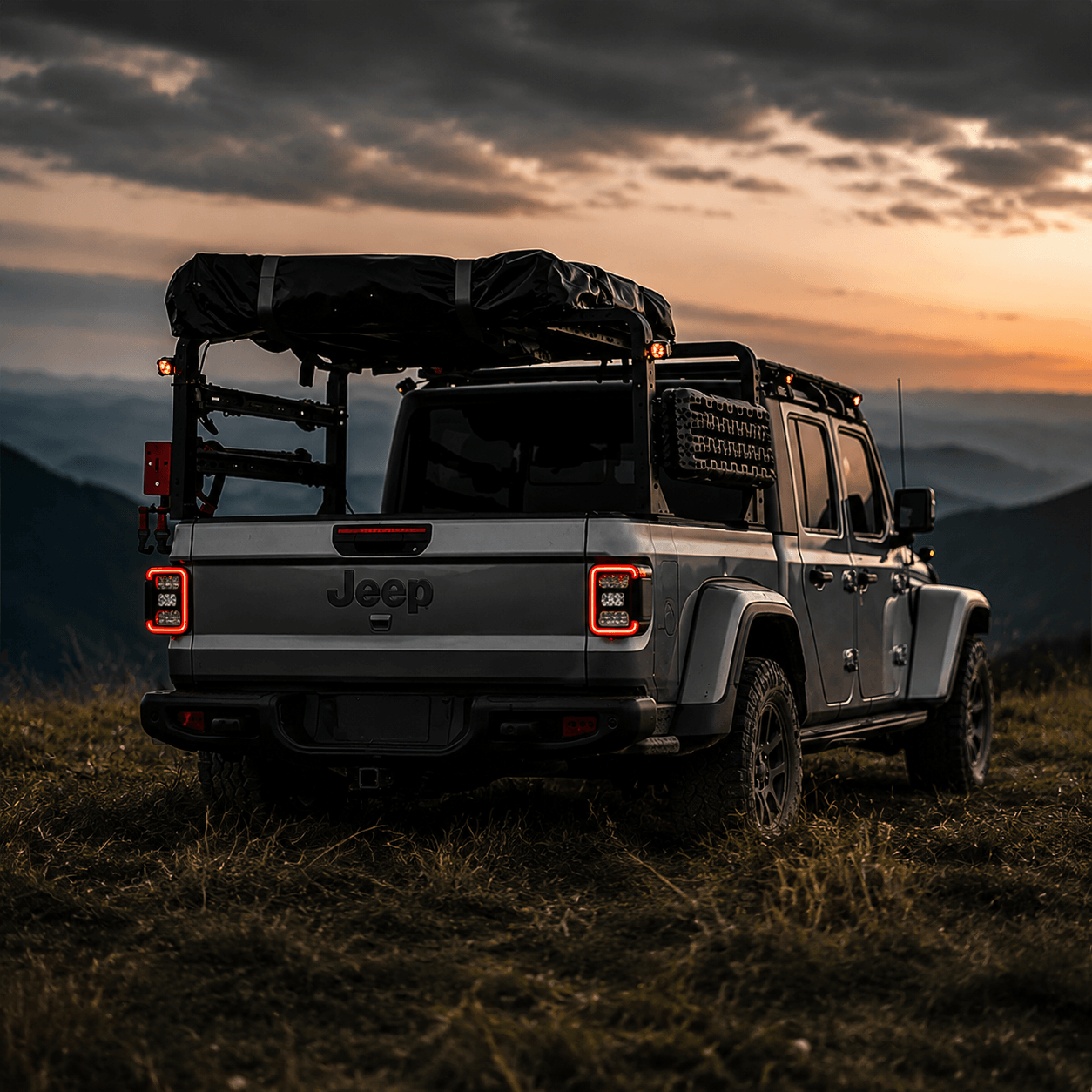 Jeep Gladiator bed rack installed above a Mopar hard tri-fold tonneau cover
