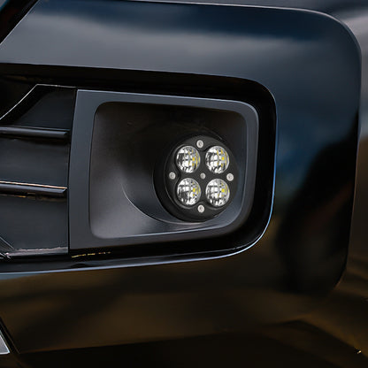 Installed LED fog lights on 2023 Toyota Tacoma showing modern look and bright white illumination