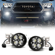 Off-road Toyota Tacoma equipped with aluminum housing LED fog lights for rugged performance and visibility