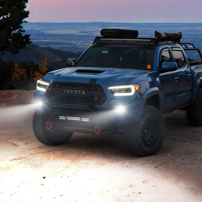 Bright 8000LM LED fog lights on Toyota Tacoma providing wide visibility and safety during night driving