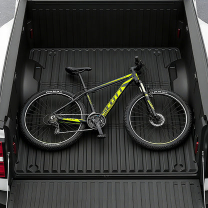 All-weather rubber Toyota Tundra 2022-2025 5FT bed mat resists rain, snow, and mud.