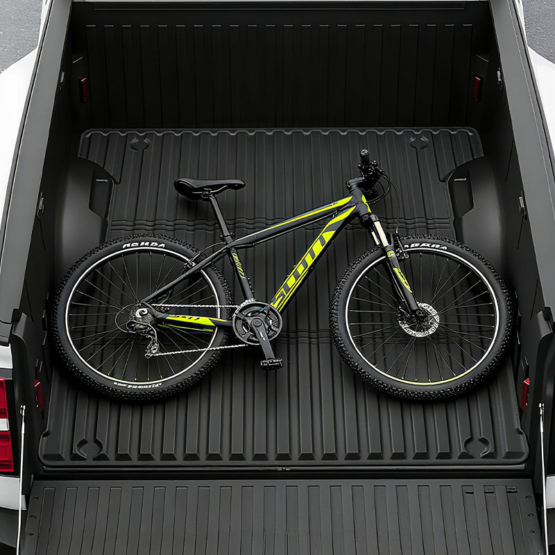 All-weather rubber Toyota Tundra 2022-2025 5FT bed mat resists rain, snow, and mud.